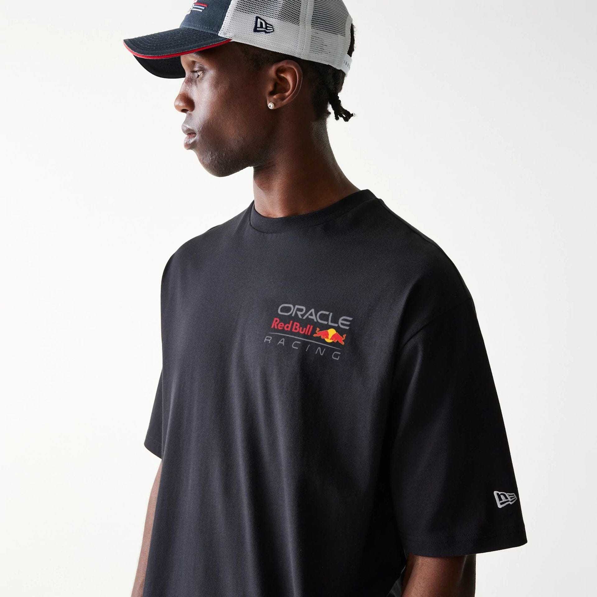 The Male model is wearing Red Bull Racing Black Oversized T-Shirt 3