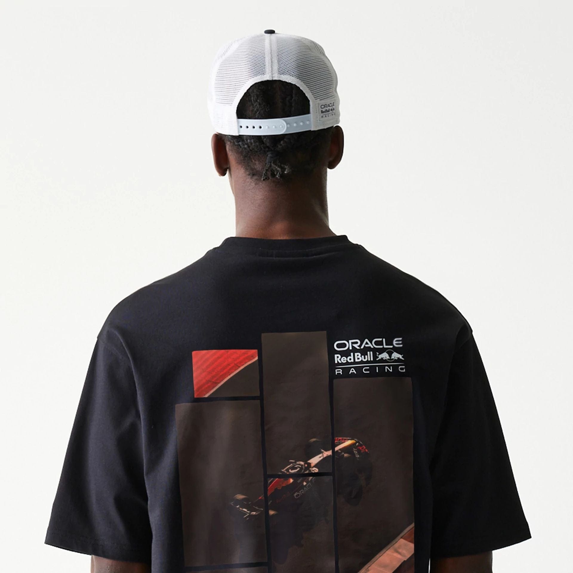The Male model is wearing Red Bull Racing Black Oversized T-Shirt 4