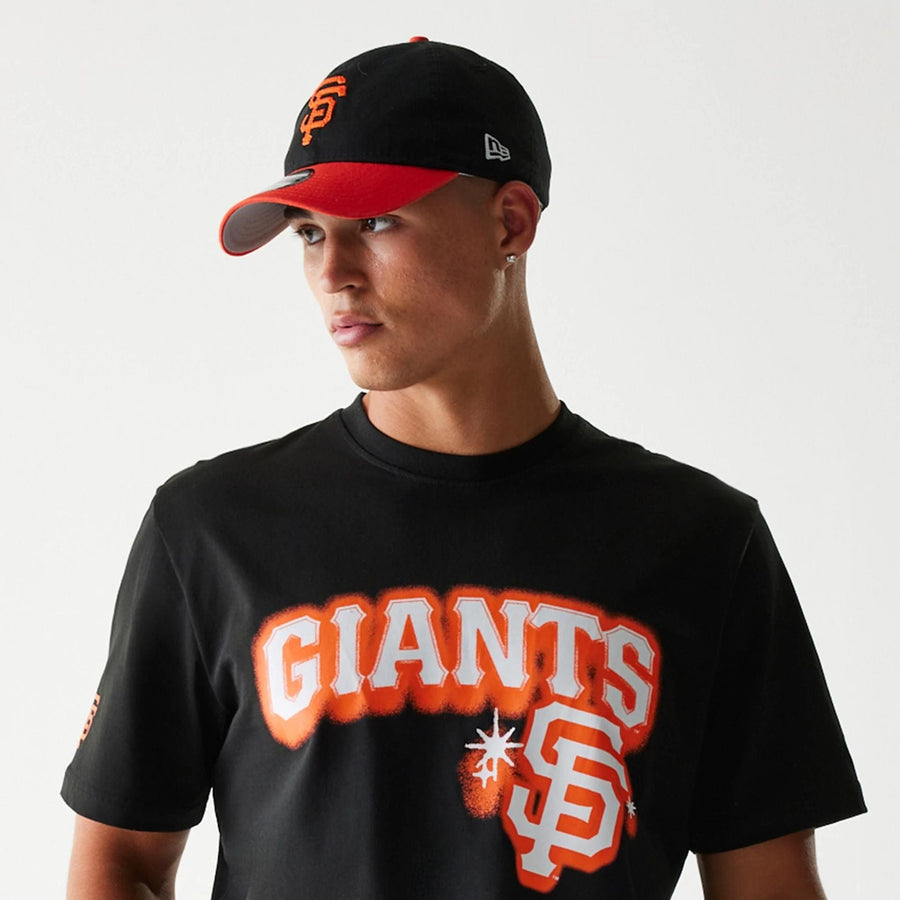 The Male model is wearing San Francisco Giants OVO x MLB Black T-Shirt 6
