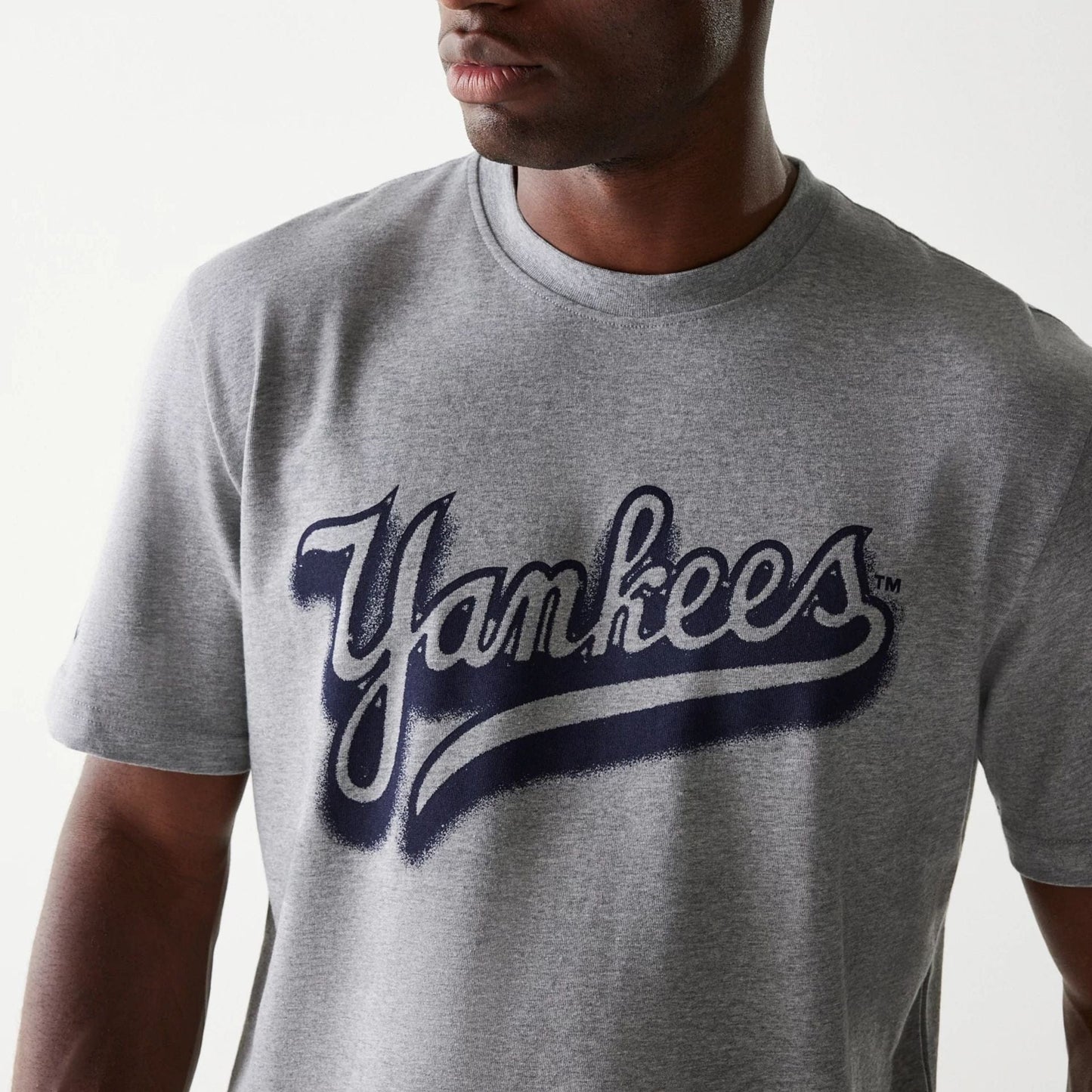 The Male model is wearing New York Yankees OVO x MLB Grey T-Shirt 3