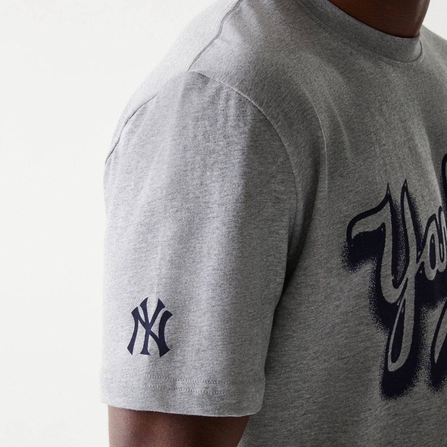 The Male model is wearing New York Yankees OVO x MLB Grey T-Shirt 4