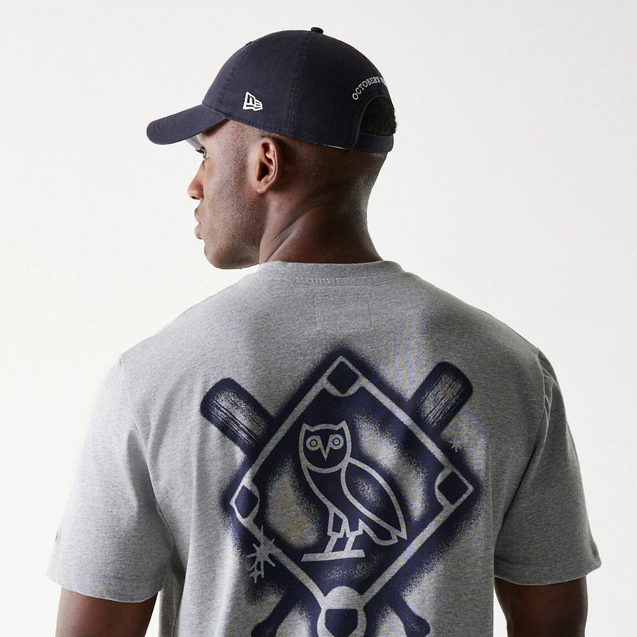 The Male model is wearing New York Yankees OVO x MLB Grey T-Shirt 7
