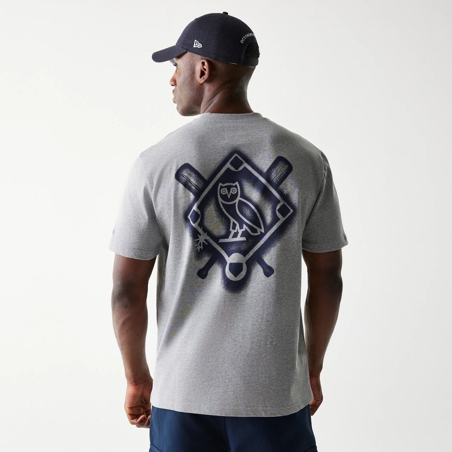 The Male model is wearing New York Yankees OVO x MLB Grey T-Shirt 2