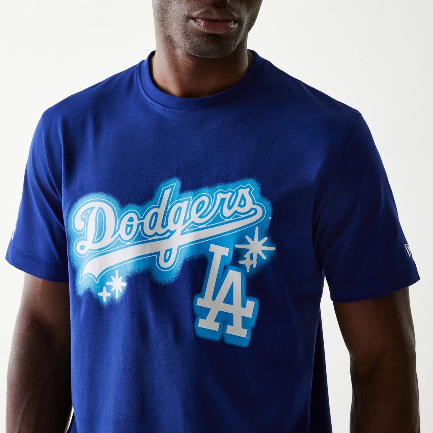 The Male model is wearing LA Dodgers OVO x MLB Dark Blue T-Shirt 3