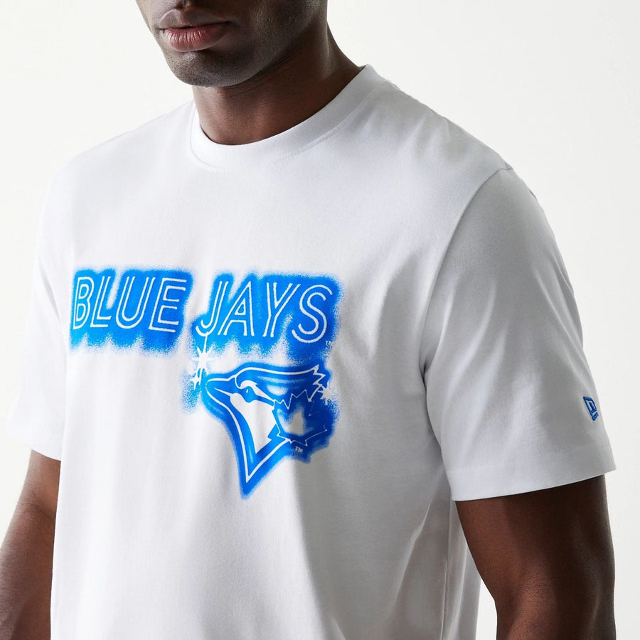 The Male model is wearing Toronto Blue Jays OVO x MLB White T-Shirt 7