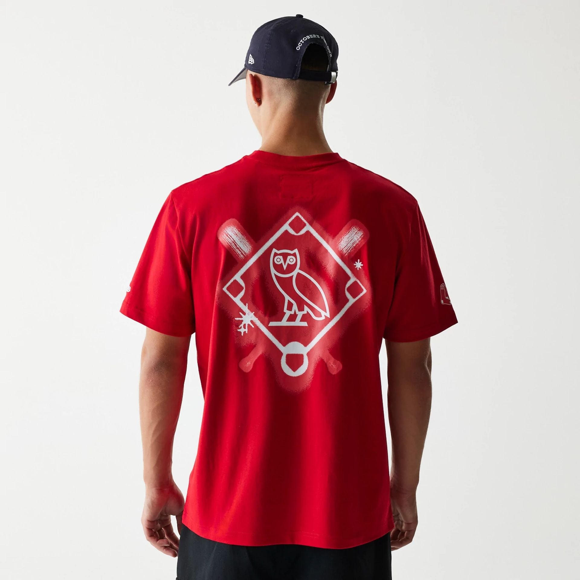 The Male model is wearing Boston Red Sox OVO x MLB Red T-Shirt 2