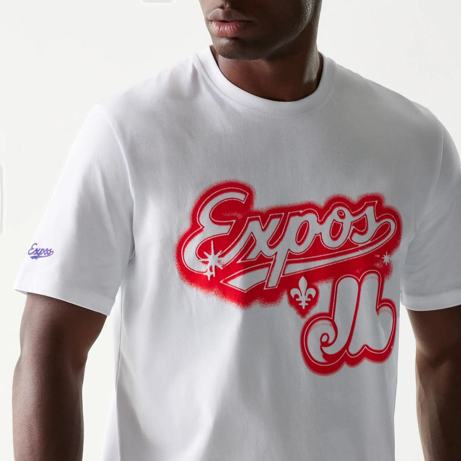The Male model is wearing Montreal Expos OVO x MLB White T-Shirt 3