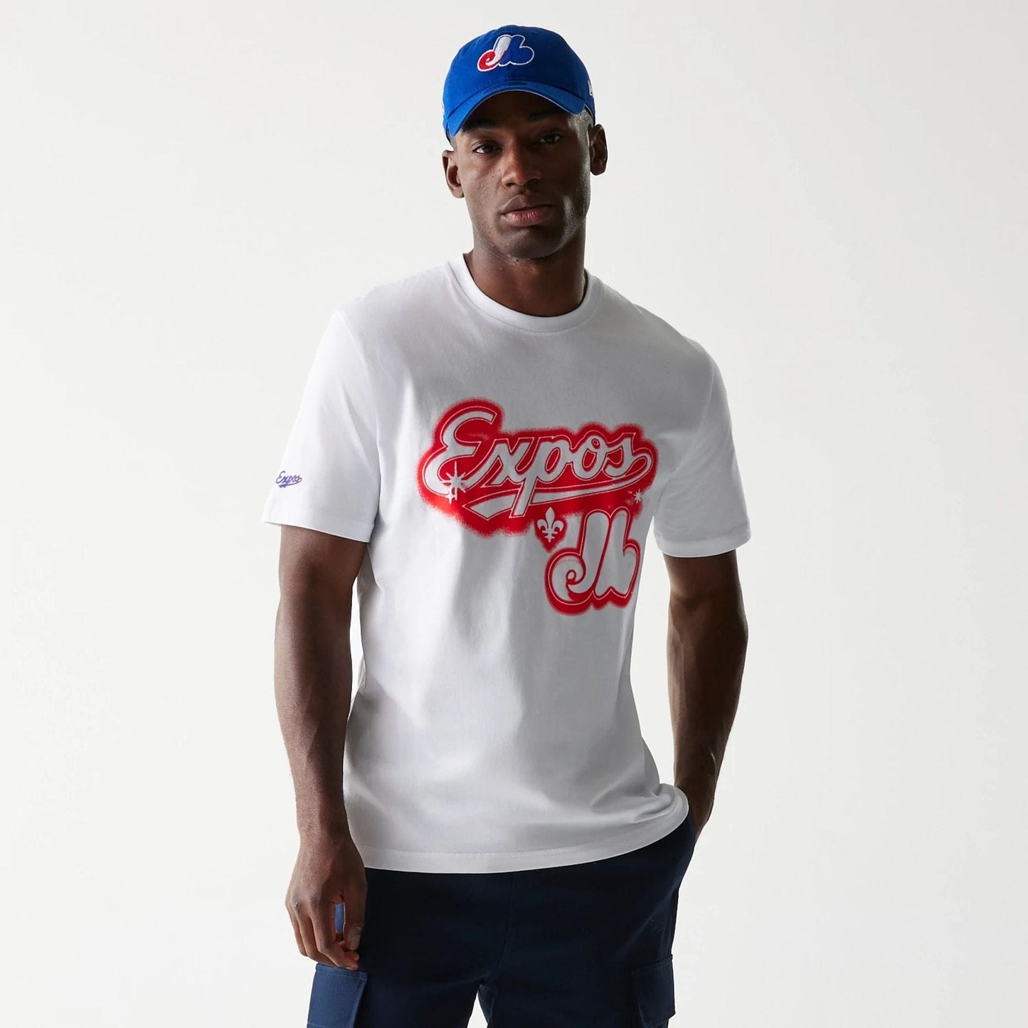 The Male model is wearing Montreal Expos OVO x MLB White T-Shirt 1