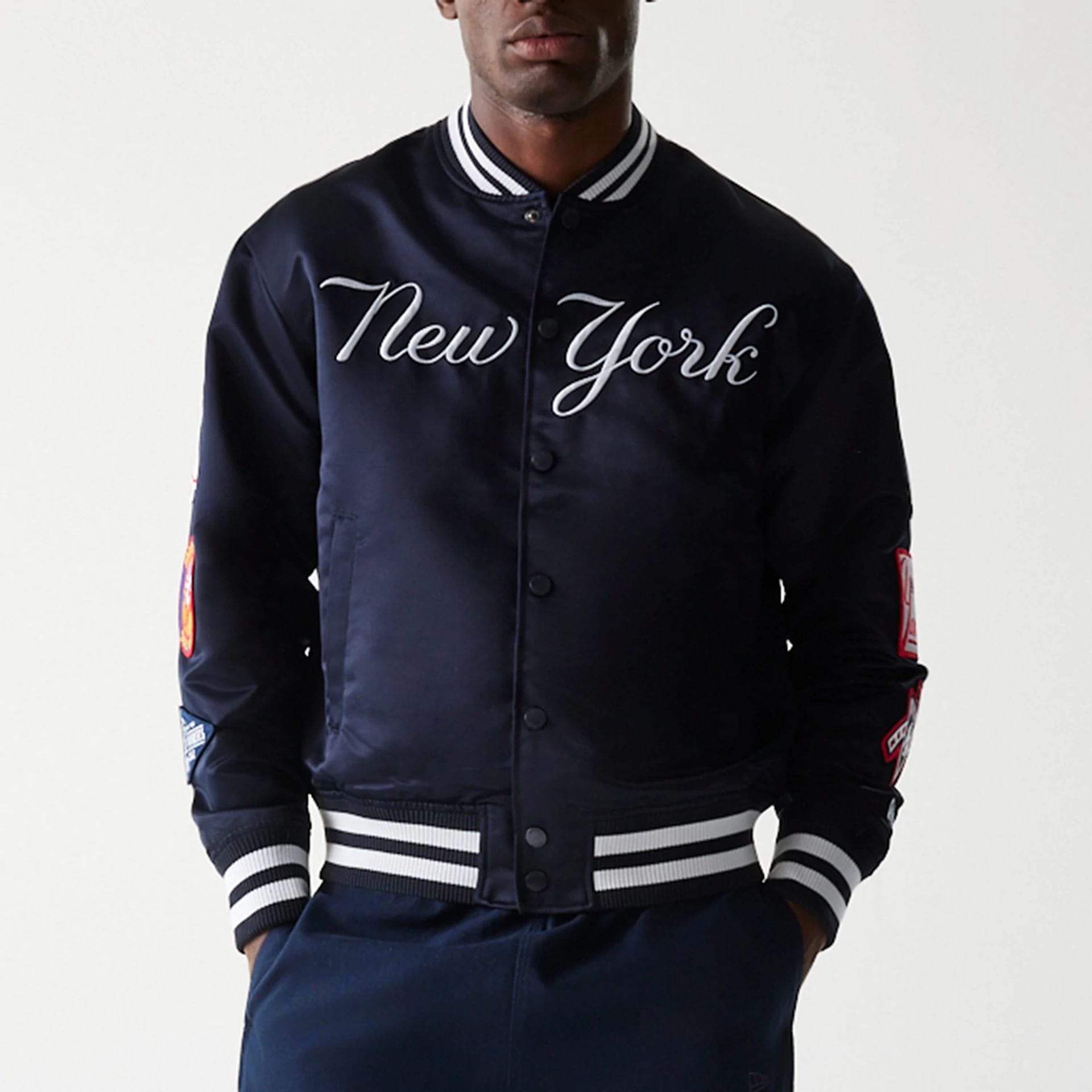 The Male model is wearing New York Yankees OVO x MLB Navy Jacket 5