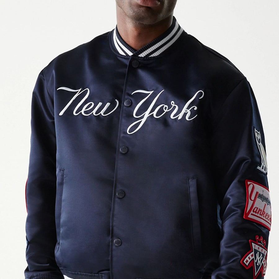 The Male model is wearing New York Yankees OVO x MLB Navy Jacket 3