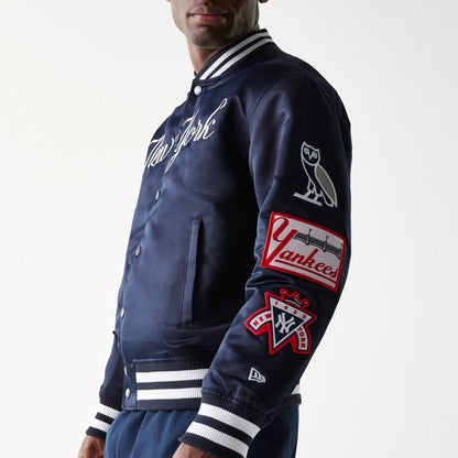 The Male model is wearing New York Yankees OVO x MLB Navy Jacket 4