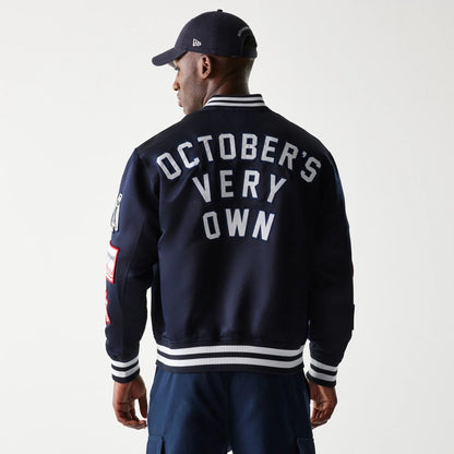 The Male model is wearing New York Yankees OVO x MLB Navy Jacket 2