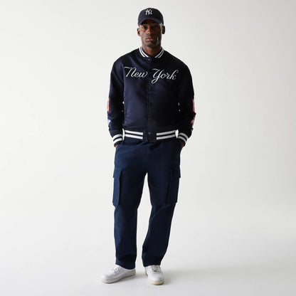 The Male model is wearing New York Yankees OVO x MLB Navy Jacket 8