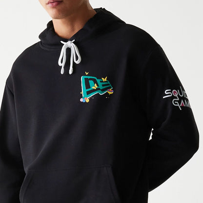 The Male model is wearing Netflix Squid Game Black Oversized Pullover Hoodie 5