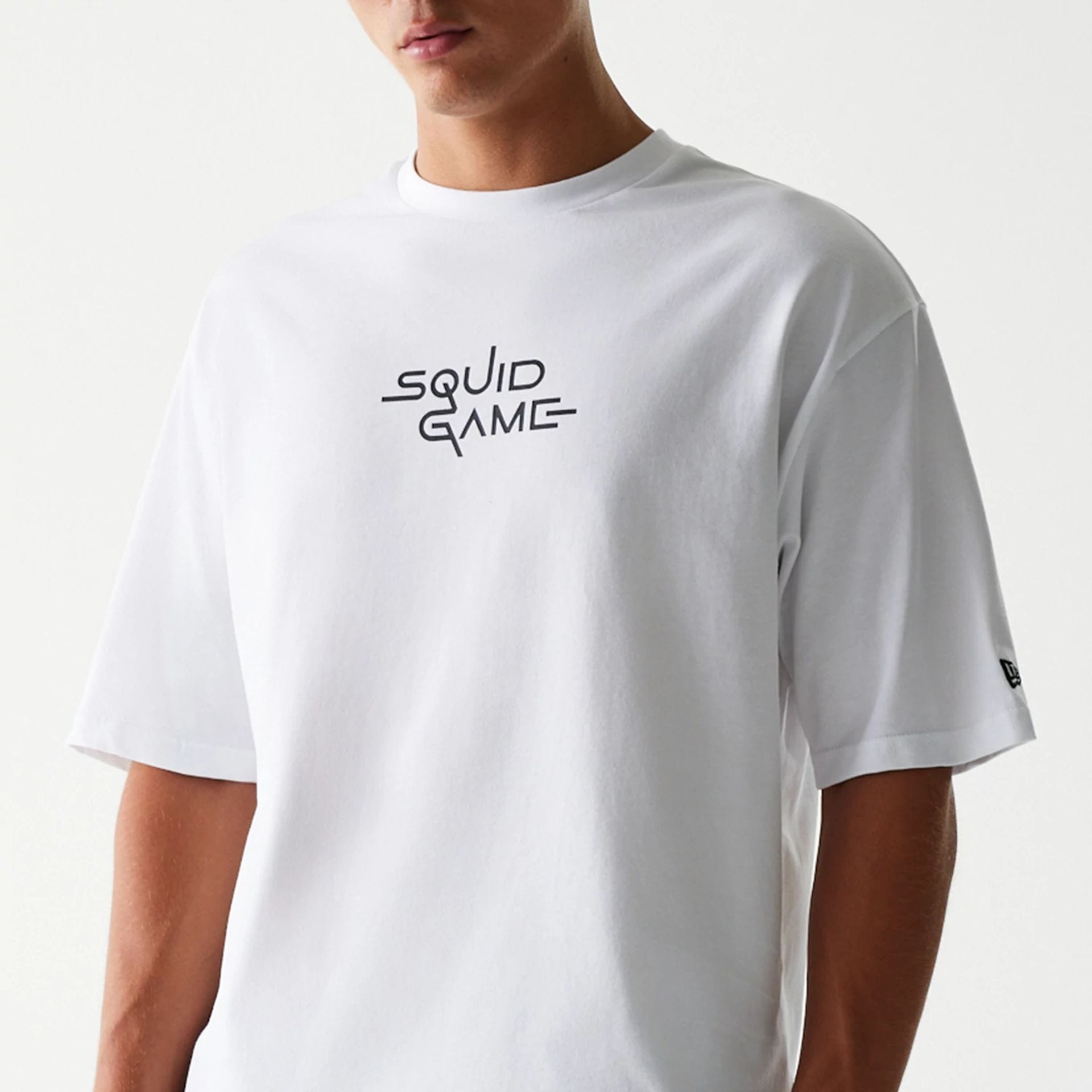 The Male model is wearing Netflix Squid Game White Oversized T-Shirt 3