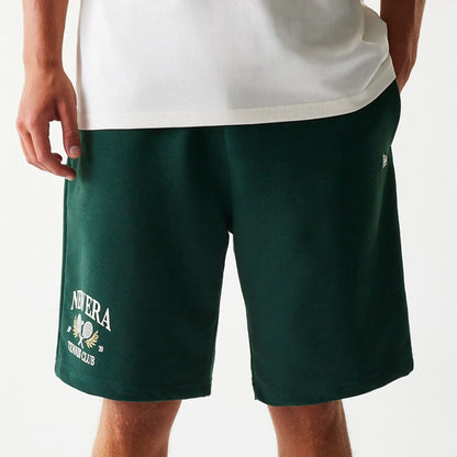 The Male model is wearing New Era Front Logo Dark Green Shorts 4