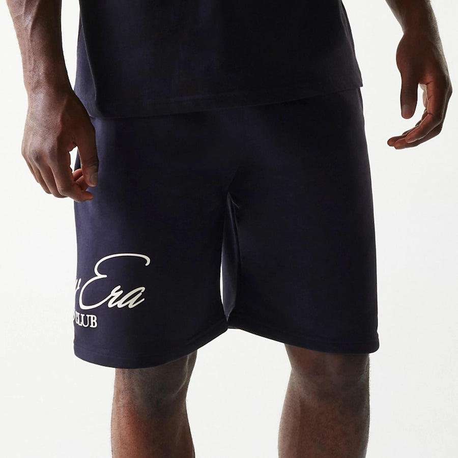The Male model is wearing New Era Side Logo Navy Shorts 3