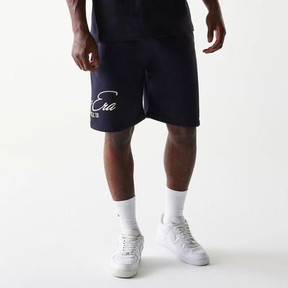 The Male model is wearing New Era Side Logo Navy Shorts 1