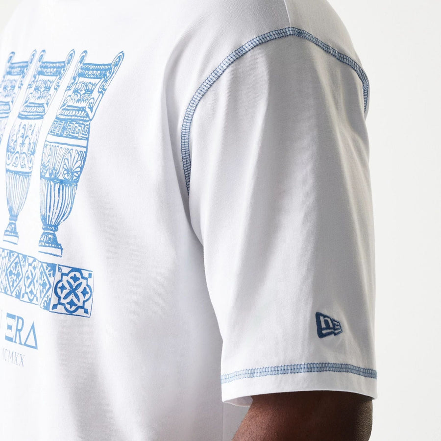 The Male model is wearing New Era Orthodox Vase White Oversized T-Shirt 5