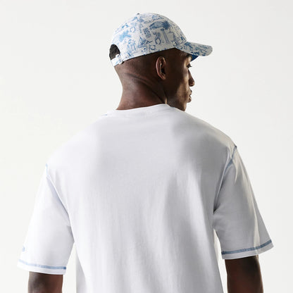 The Male model is wearing New Era Orthodox Vase White Oversized T-Shirt 7