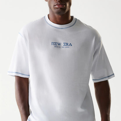 The Male model is wearing New Era Orthodox Church White Oversized T-Shirt 4
