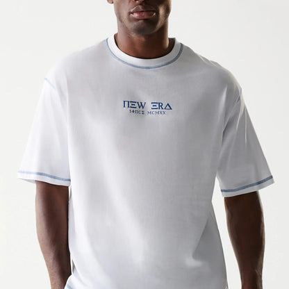 The Male model is wearing New Era Orthodox Church White Oversized T-Shirt 4
