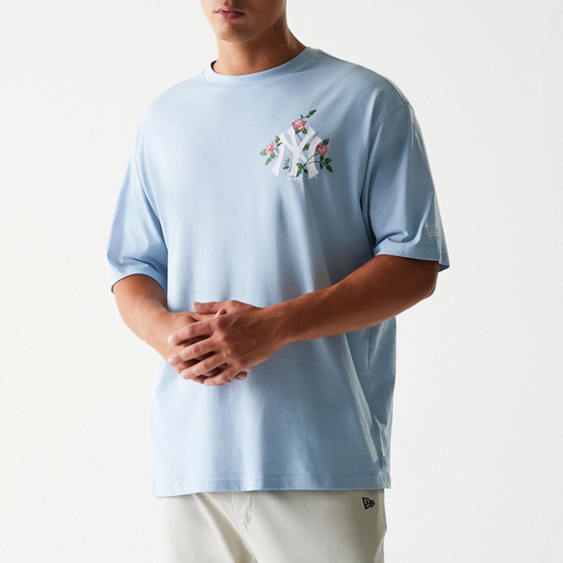 The Male model is wearing New York Yankees MLB Floral Pastel Blue Oversized T-Shirt 3