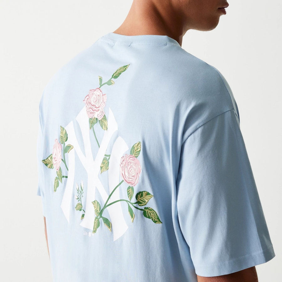 The Male model is wearing New York Yankees MLB Floral Pastel Blue Oversized T-Shirt 6