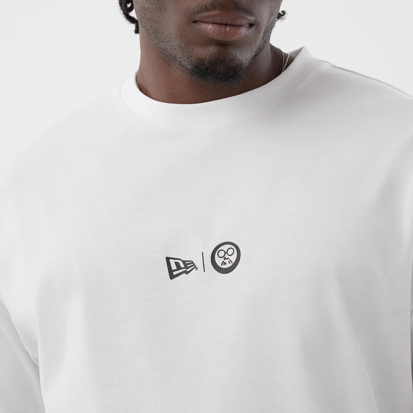 The Male model is wearing Sakamoto Days Netflix White T-Shirt 4