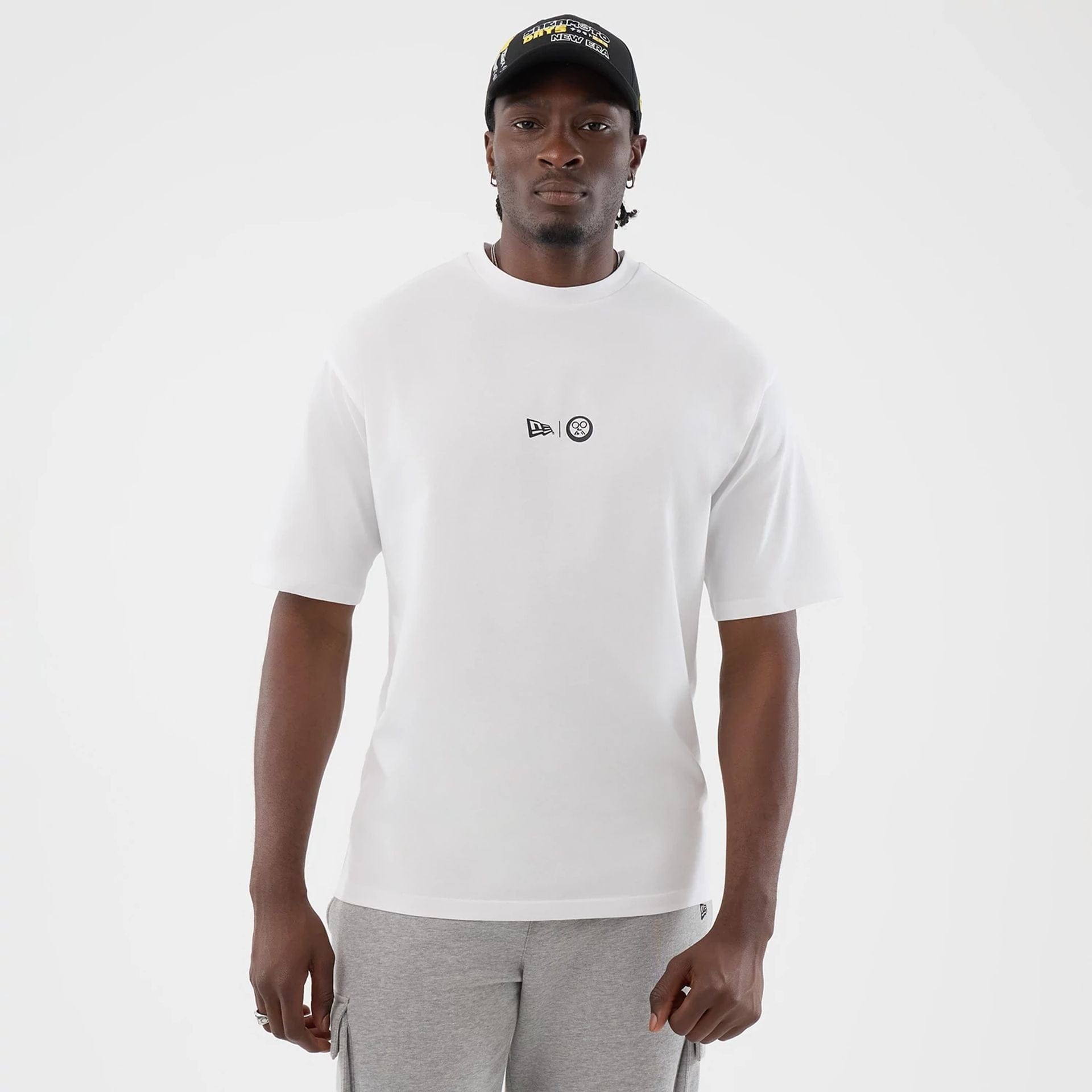 The Male model is wearing Sakamoto Days Netflix White T-Shirt  1