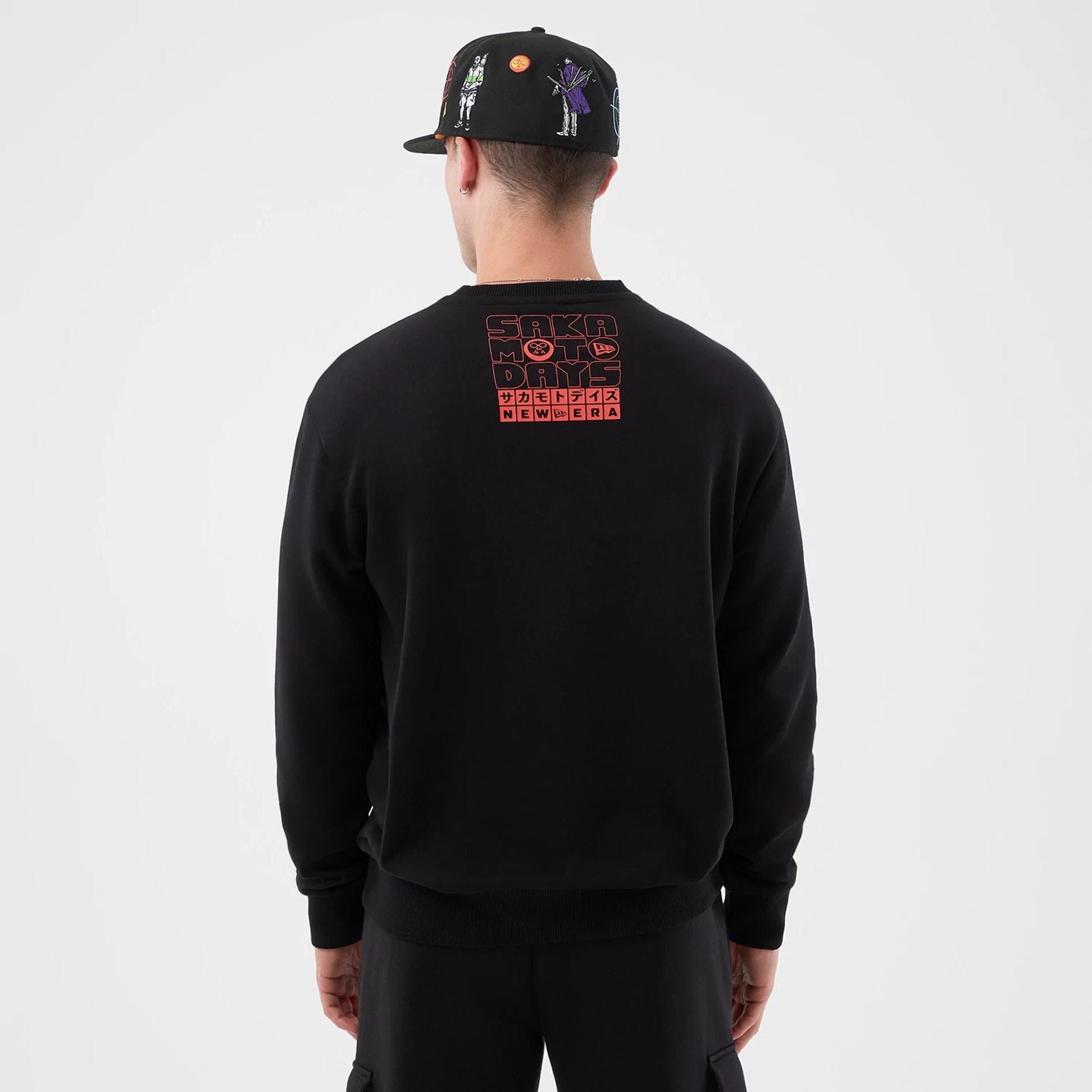 The Male model is wearing Sakamoto Days Netflix Black Crew Neck Sweater  2