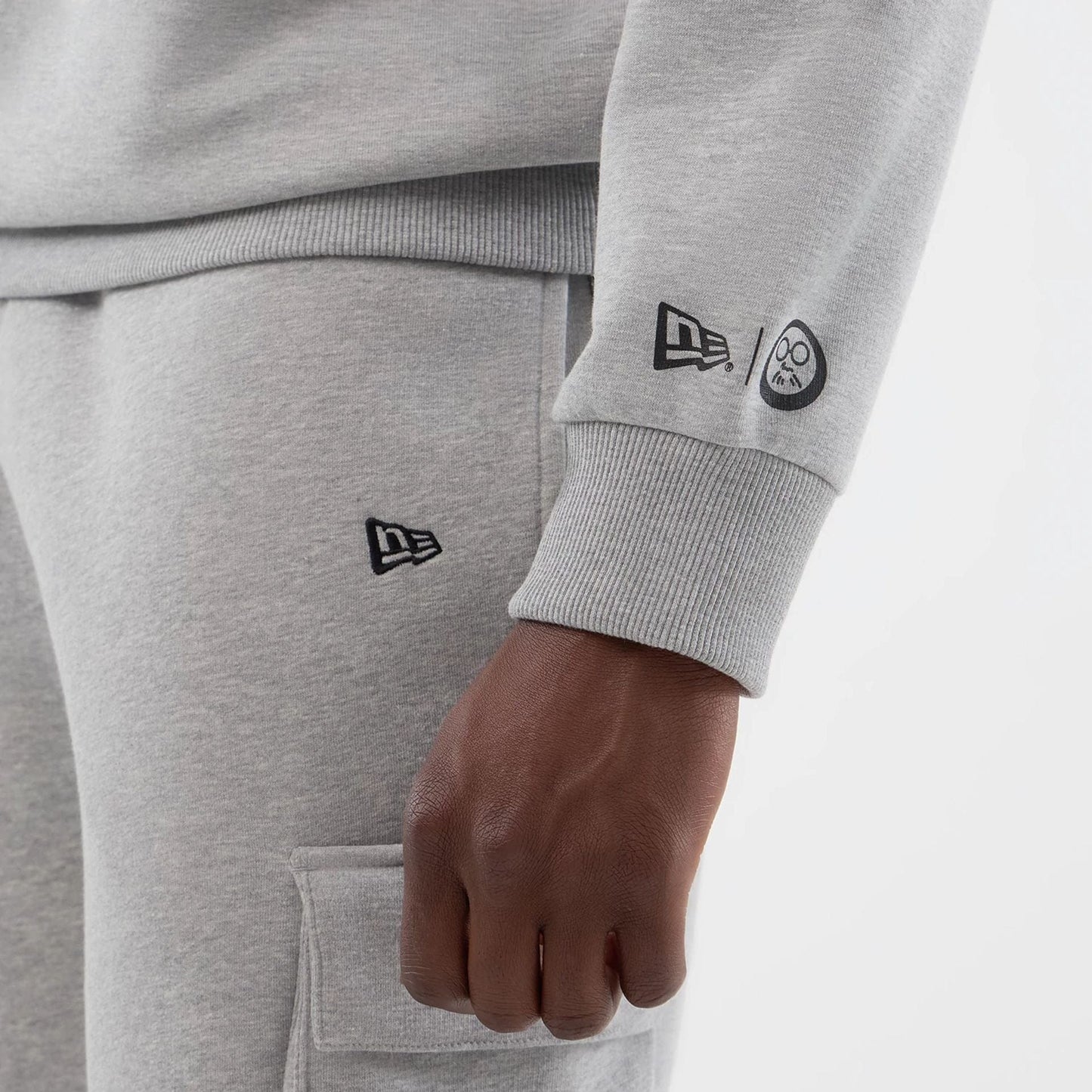 The Male model is wearing Sakamoto Days Netflix Grey Crew Neck Sweater  4