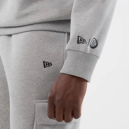 The Male model is wearing Sakamoto Days Netflix Grey Crew Neck Sweater  4