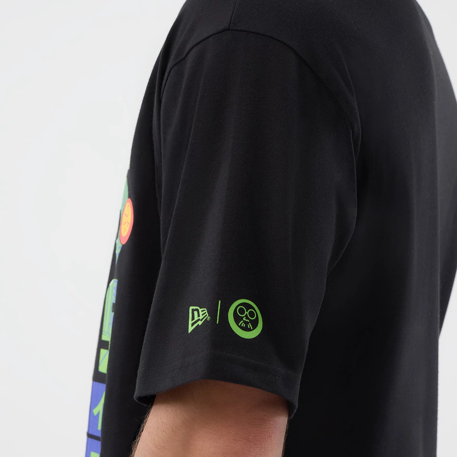 The Male model is wearing Sakamoto Days Netflix Black T-Shirt 4