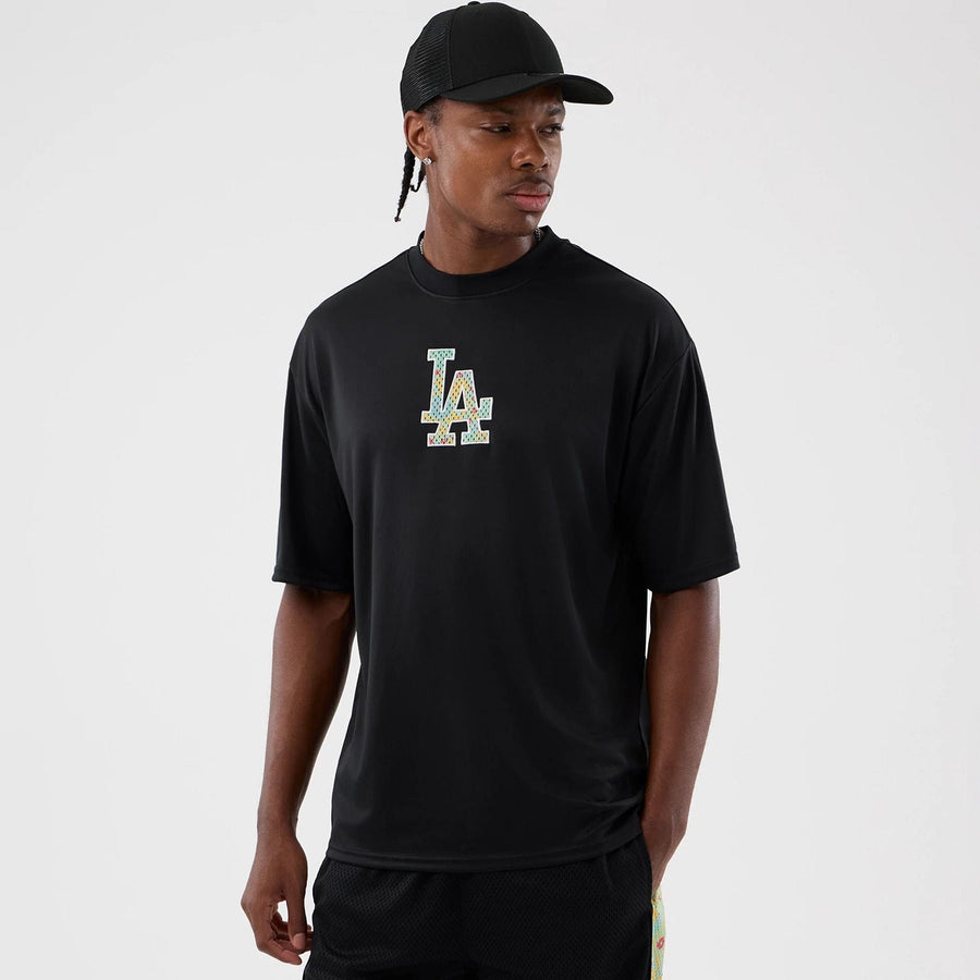 The Male model is wearing LA Dodgers MLB Mesh Infill Black Oversized T-Shirt 1