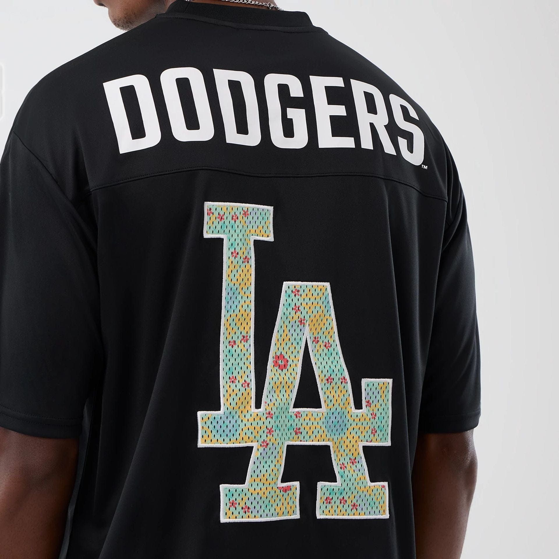 The Male model is wearing LA Dodgers MLB Mesh Infill Black Oversized T-Shirt 4