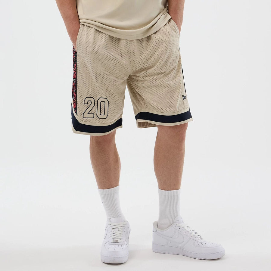 The Male model is wearing New Era Mesh Light Beige Mesh Shorts 7