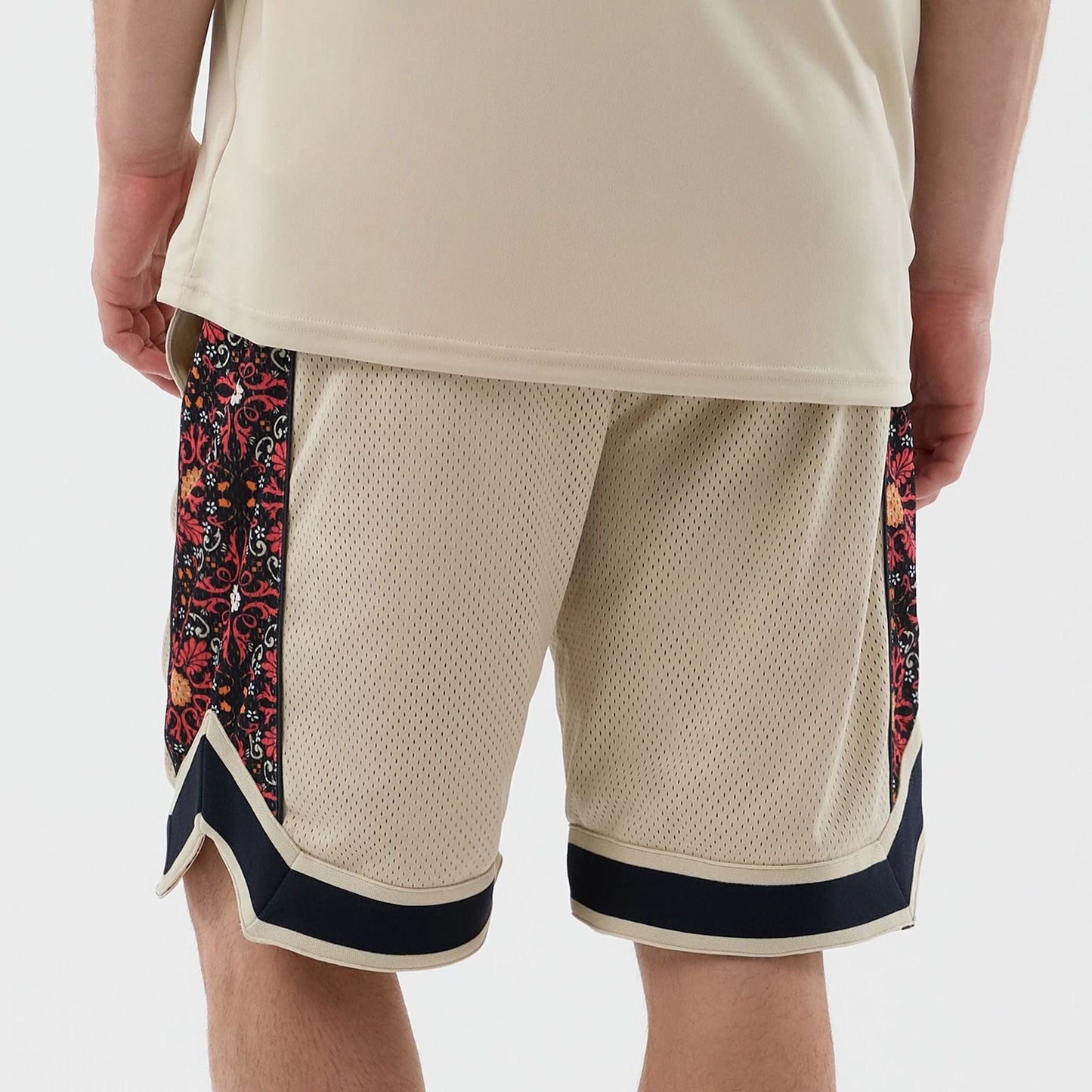 The Male model is wearing New Era Mesh Light Beige Mesh Shorts 6