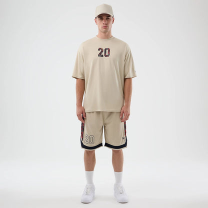 The Male model is wearing New Era Mesh Light Beige Mesh Shorts 8