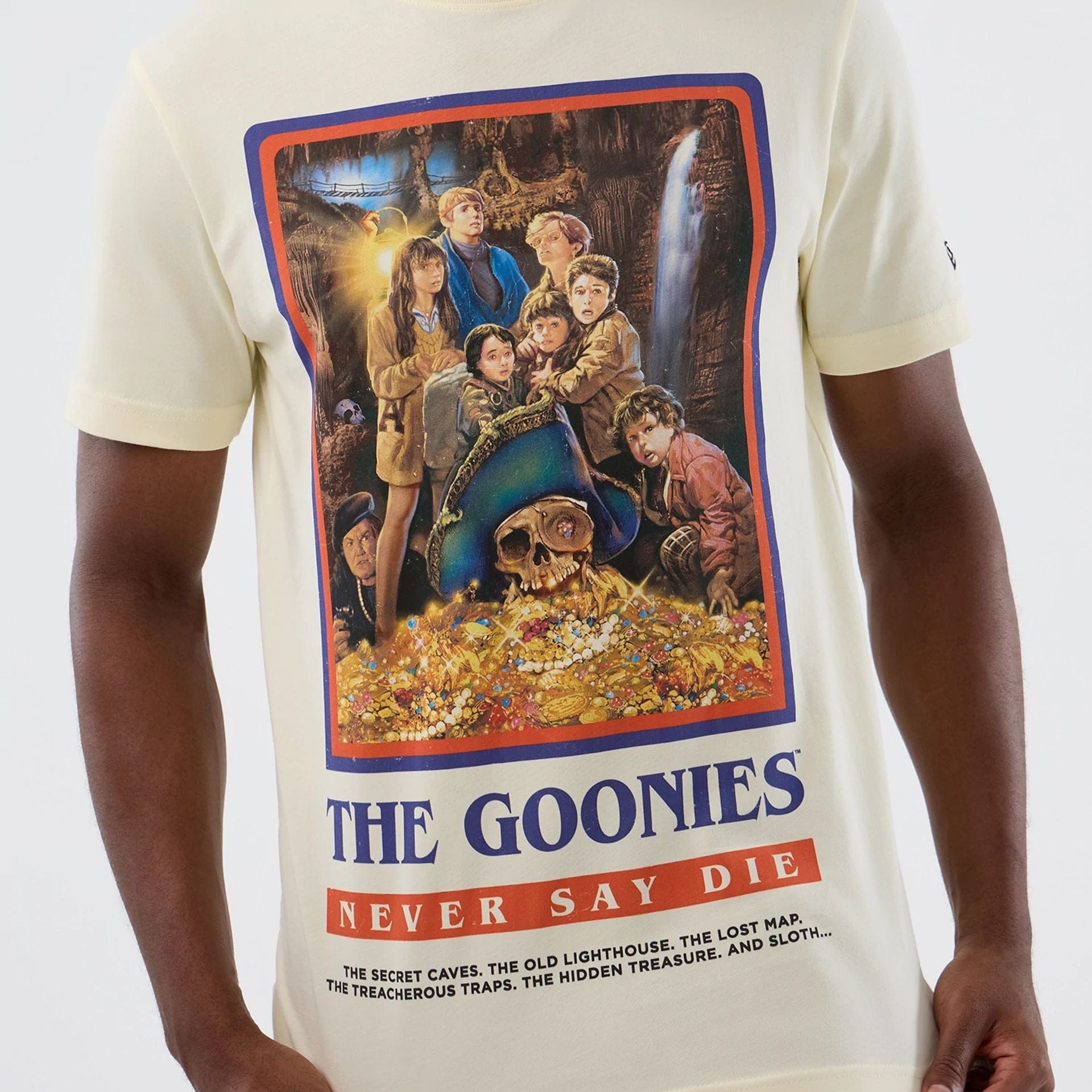 The model is wearing this Movie Poster The Goonies T-Shirt in Cream. 3