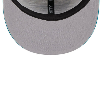 This is a Jacksonville Jaguars NFL Salute To Service 2025 Turquoise 9FIFTY Snapback Adjustable Cap 2