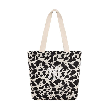 Pictured is this MLB Cow Jacquard New York Yankees Tote Bag in cream. 1