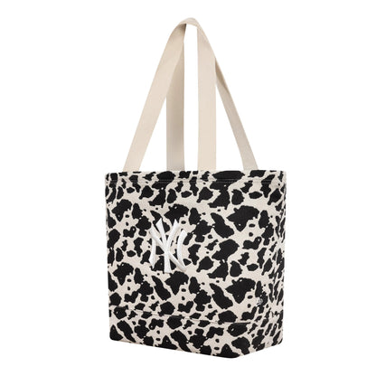 Pictured is this MLB Cow Jacquard New York Yankees Tote Bag in cream. 1