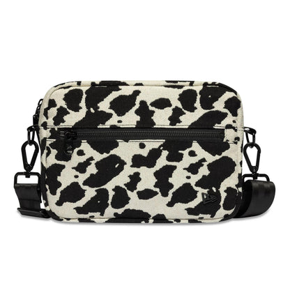 Pictured is this New Era Cow Jacquard Waist Bag in light beige. 2
