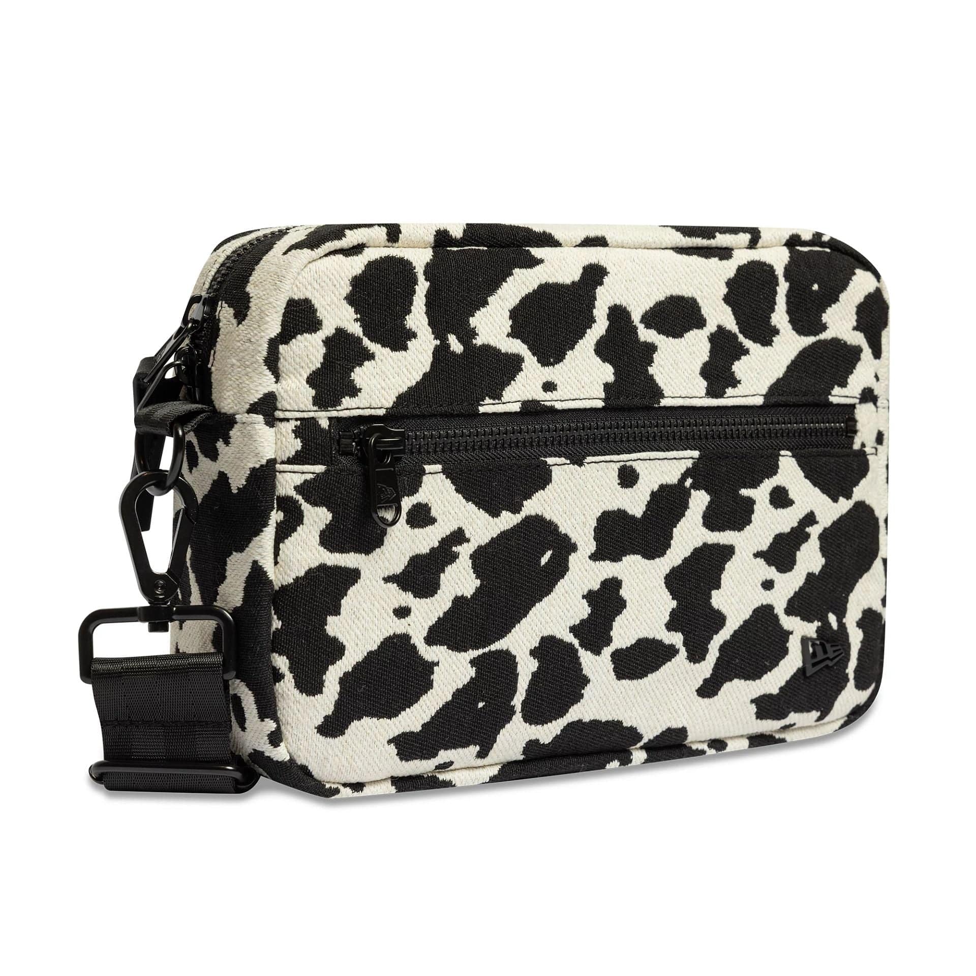 Pictured is this New Era Cow Jacquard Waist Bag in light beige. 3