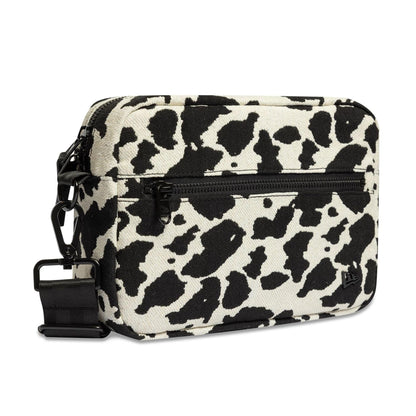 Pictured is this New Era Cow Jacquard Waist Bag in light beige. 3