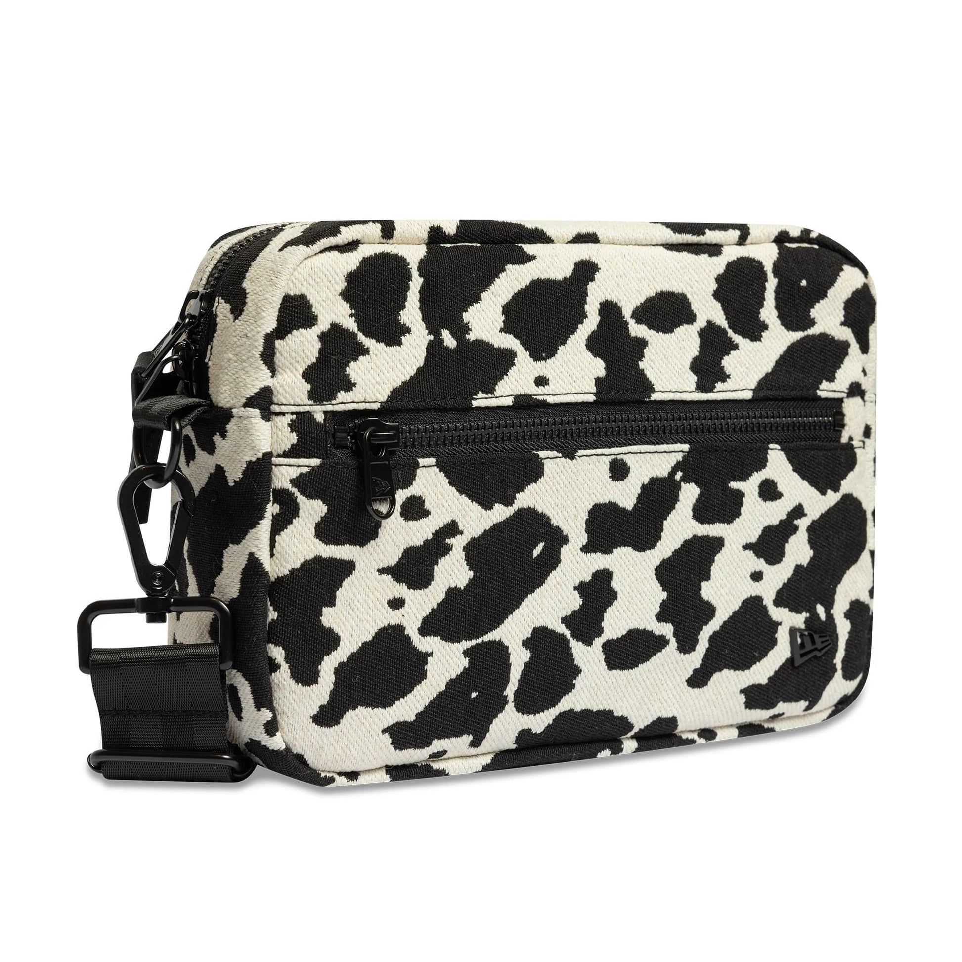 Pictured is this New Era Cow Jacquard Waist Bag in light beige. 3