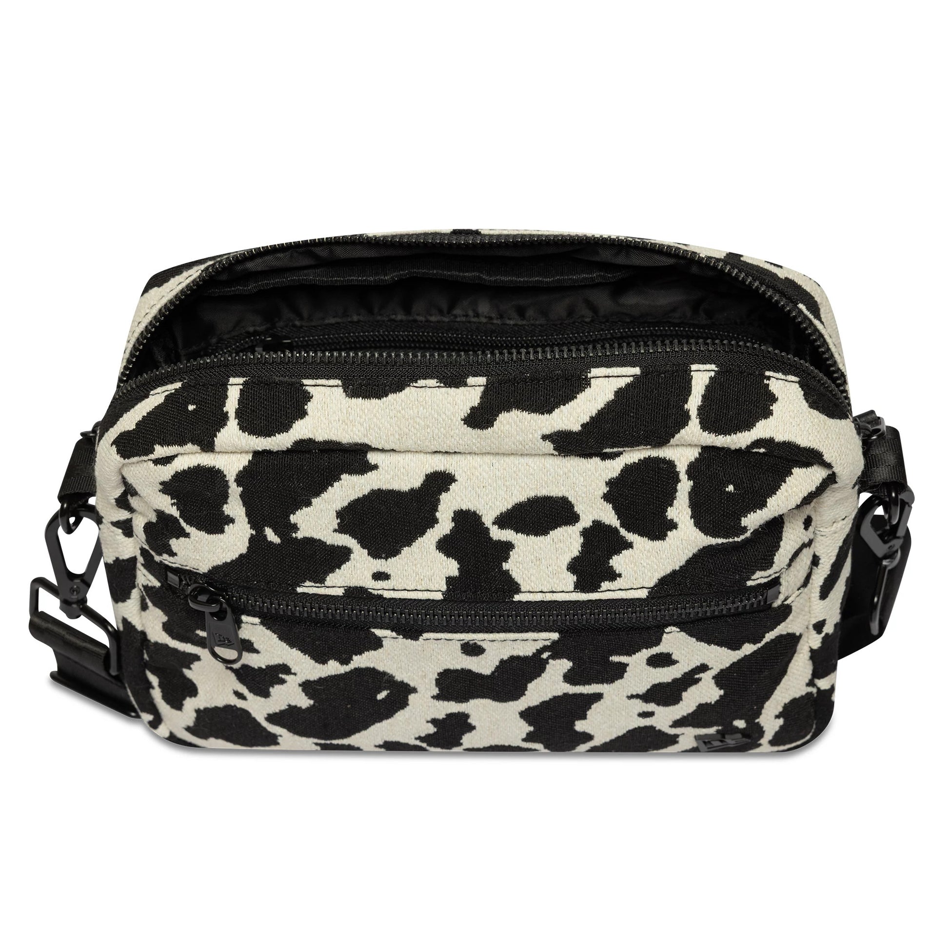 Pictured is this New Era Cow Jacquard Waist Bag in light beige. 5