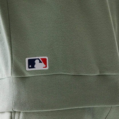 The model is wearing this MLB League Essential Midi LA Dodgers Oversized Crew Neck Sweater in pastel green. 8