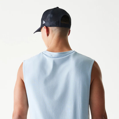 The model is wearing this MLB League Essential New York Yankees Sleeveless T-Shirt in pastel blue. 7